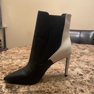 Nice pair of black and white above the ankle boots